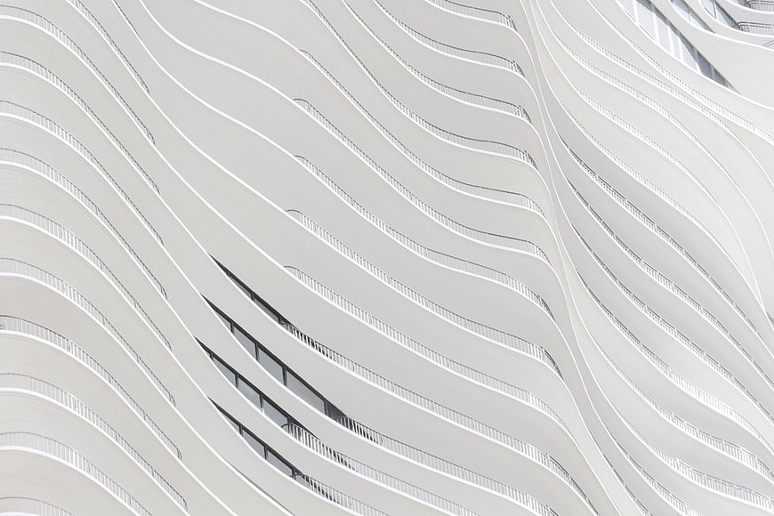 Abstract White Wavy Modern Building Facade Architecture