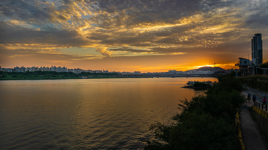 Golden Sunset Over Seoul River with City Skyline