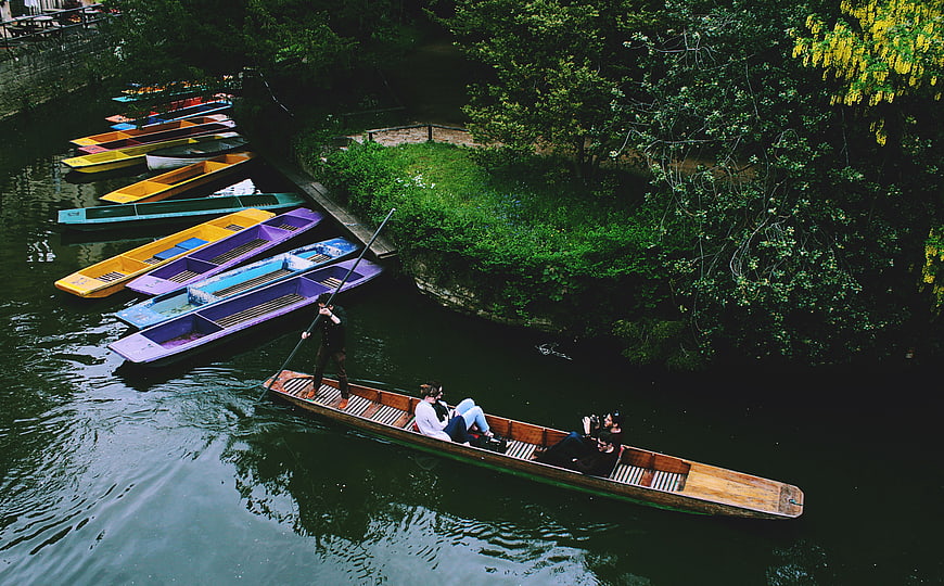 High angle view of punting on a river with colorful boats