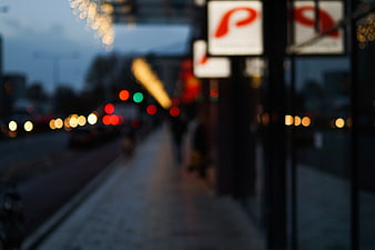 Blurred City Street Scene with Bokeh Lights at Dusk
