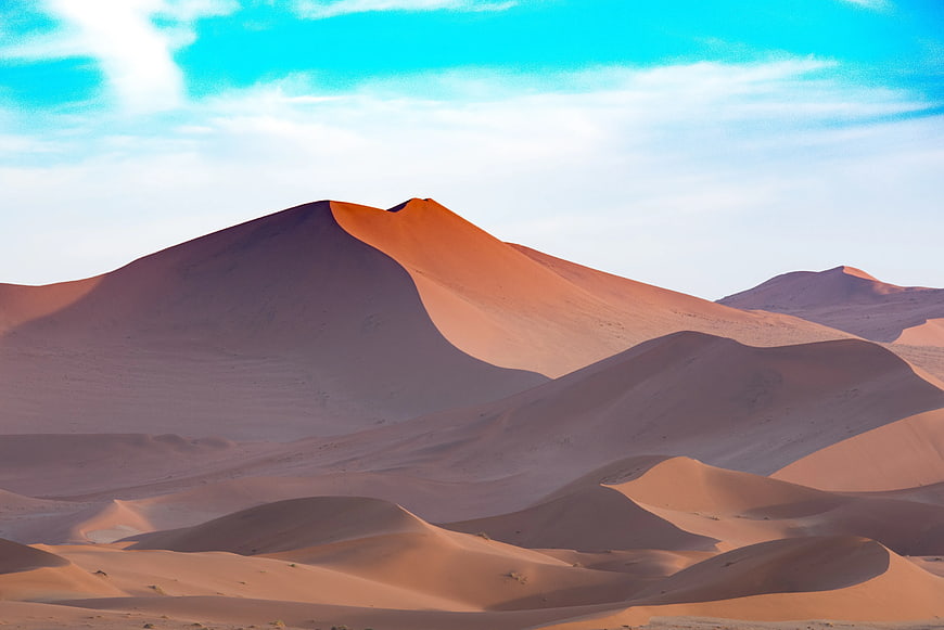 Red Sand Dunes Landscape Under Blue Sky