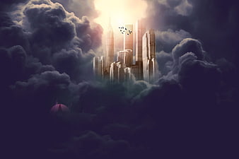 Futuristic city skyline emerging from dark clouds with golden light