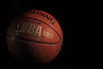 Dramatic Spalding NBA Basketball on Black Background