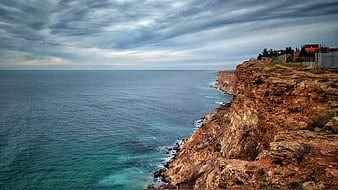 Dramatic Coastal Cliffs Overlooking Turquoise Sea