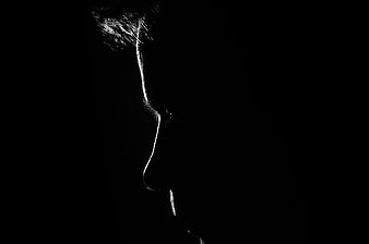 Dramatic Black and White Silhouette of a Man's Profile