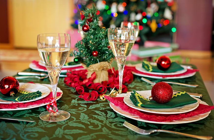 Festive Christmas Table Setting with Champagne and Decorations