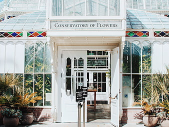 White Victorian Conservatory of Flowers Entrance with Tropical Plants