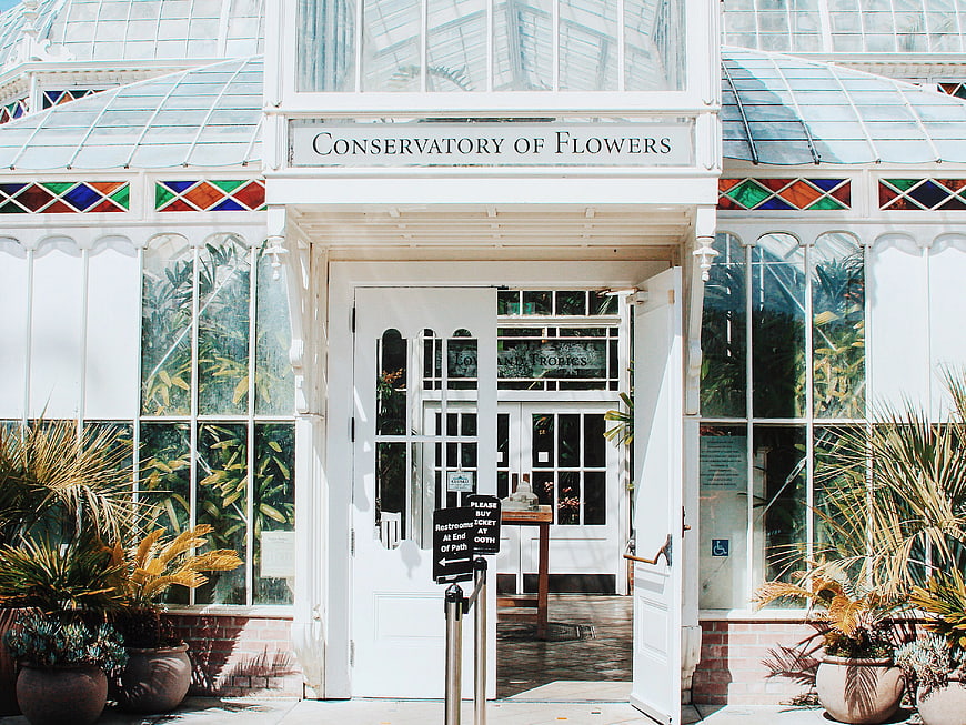 White Victorian Conservatory of Flowers Entrance with Tropical Plants