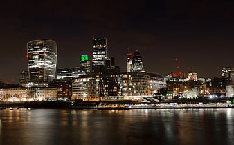 London Skyline at Night with River Thames Reflections