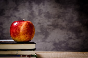 Red Apple on Stack of Books with Copyspace