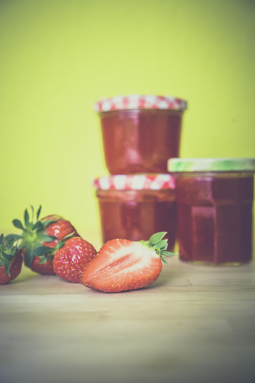 Fresh Strawberry Jam Jars with Whole and Sliced Strawberries