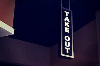 Illuminated Take Out Sign Hanging in Dark Interior