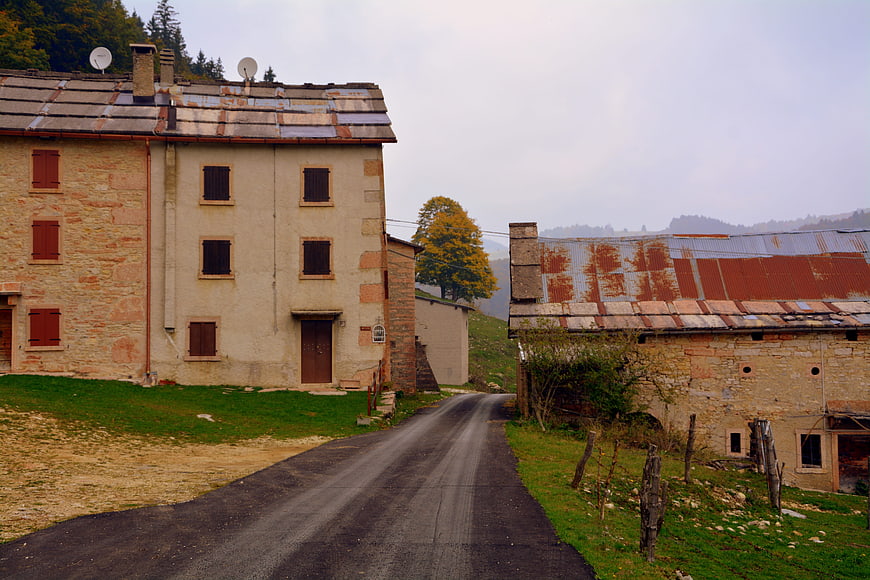 Rural Italian Village Street with Stone Houses and Rusty Roof