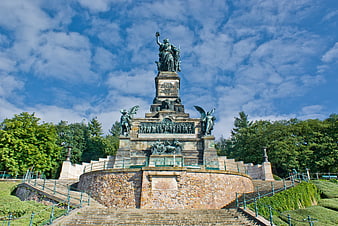 Nelson Monument in Edinburgh with Blue Sky and Clouds