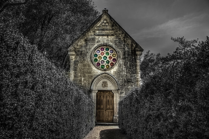 Gothic Chapel with Colorful Rose Window in Black and White