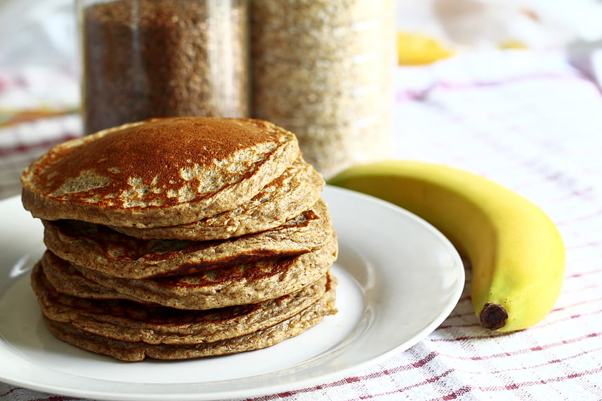 Stack of Whole Wheat Banana Pancakes on White Plate