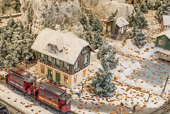 Miniature Christmas Village with Train and Coins