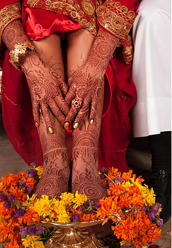 Traditional Indian Bride Mehndi Hands and Feet with Marigolds