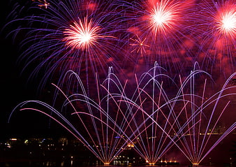 Vibrant Fireworks Display Over Night Sky
