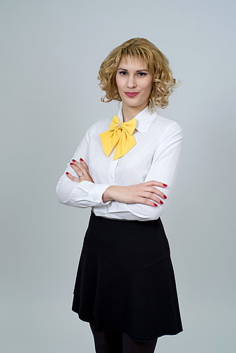 Confident Businesswoman Portrait with Yellow Bow Tie