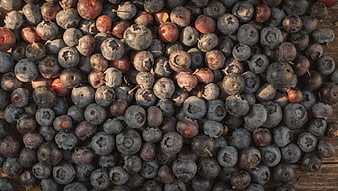 Top View of Fresh Blueberries on Rustic Wooden Surface