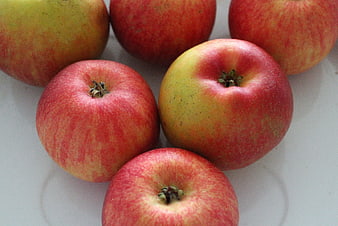 Fresh Red and Yellow Apples on White Background