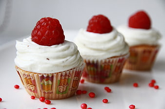 Raspberry Cupcakes with White Frosting and Sprinkles