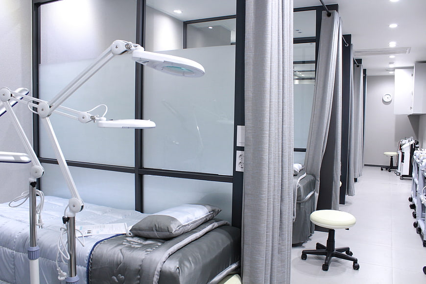 Modern dermatology clinic treatment room interior