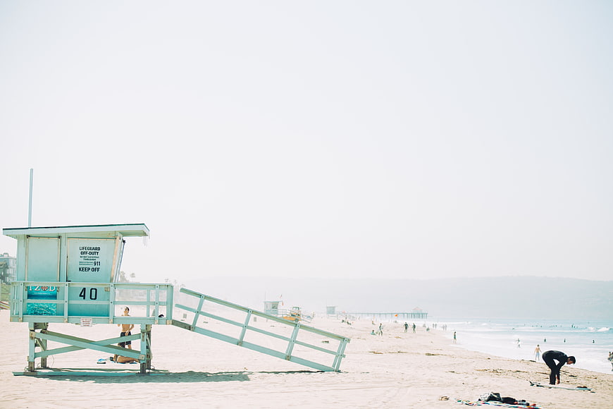 Light Blue Lifeguard Tower on Sunny Beach with Ocean View