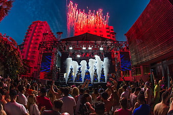 Outdoor Night Concert with Fireworks and Smoke Jets