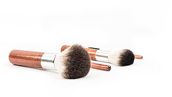 Wooden Handle Makeup Brushes With Silver Ferrules On White Background