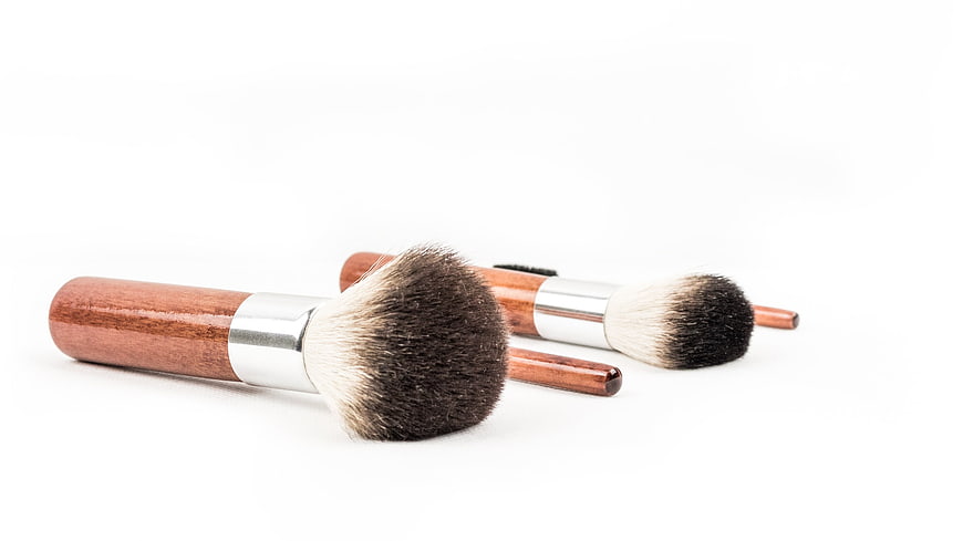 Wooden Handle Makeup Brushes With Silver Ferrules On White Background
