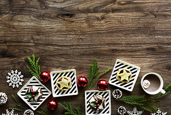 Christmas desserts and hot chocolate on rustic wooden background