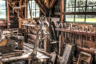 Vintage wooden workshop with antique tools and machinery