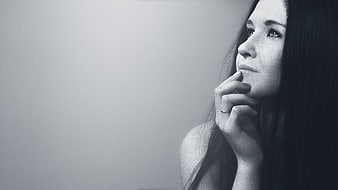Black and white portrait of a contemplative woman