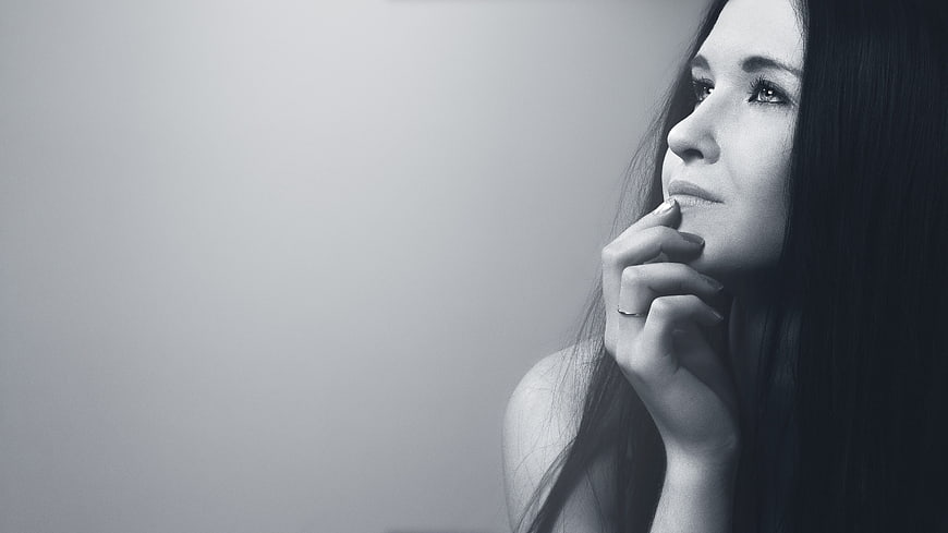 Black and white portrait of a contemplative woman