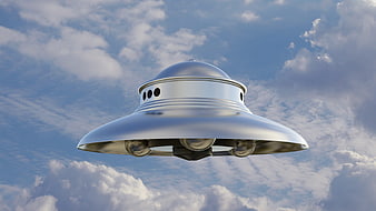 Silver UFO Saucer Flying In Blue Cloudy Sky