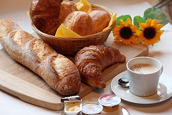 Fresh French Breakfast with Baguette, Croissants, and Coffee