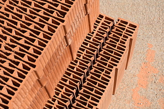 Stacked Hollow Clay Bricks With Geometric Patterns