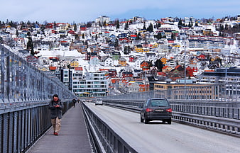 Tromso Bridge Winter View With Colorful Houses And Snowy Cityscape