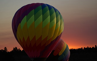 Colorful Hot Air Balloon Inflating at Sunset