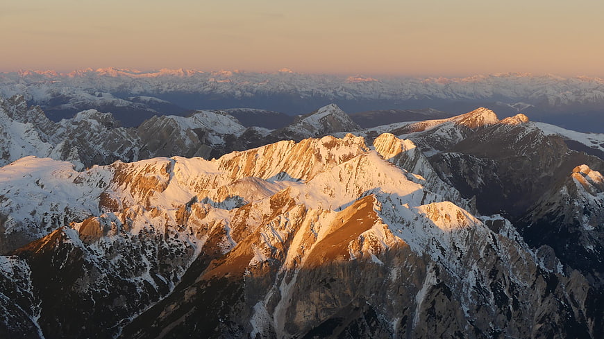 Sunrise over Snow-Capped Dolomites Mountain Range