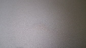 Close-up of textured gray metal surface background