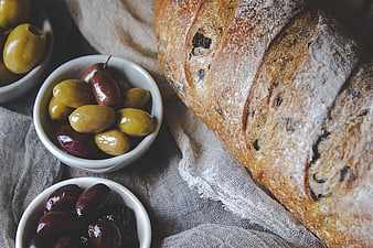 Rustic Sourdough Bread and Olives on Linen