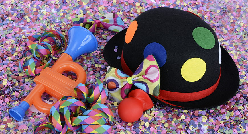 Colorful Clown Hat, Horn, and Confetti Party Supplies