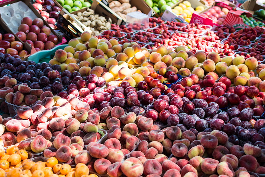 Colorful Summer Fruit Display at Outdoor Farmers Market