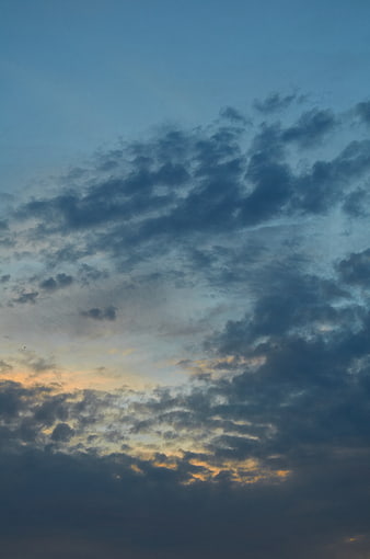 Dramatic Blue and Orange Clouds at Dusk