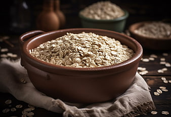 Rustic Bowl of Rolled Oats on Wooden Table