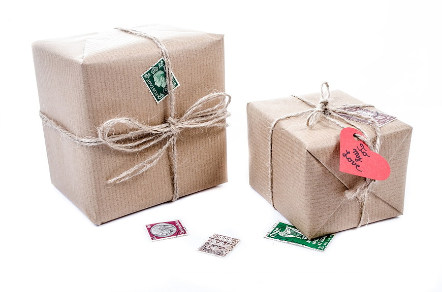 Rustic Gift Boxes Wrapped in Kraft Paper with Stamps