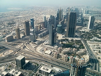 Aerial View of Dubai Skyline and Highway Interchange